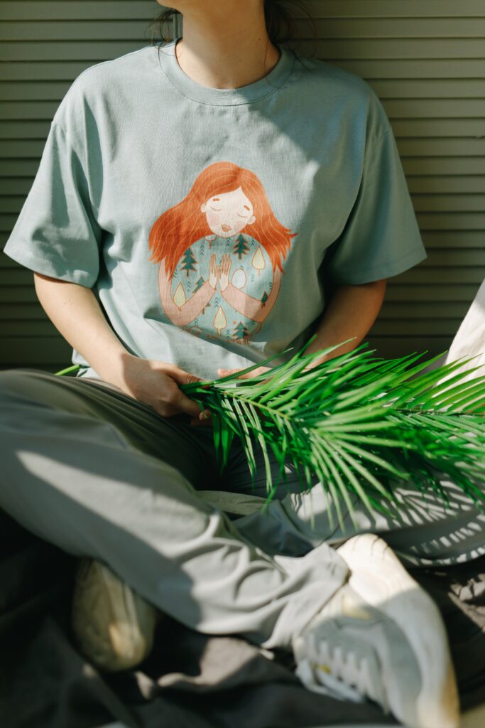 Woman Holding Palm Leaves